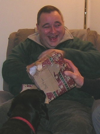 495 John with Candor opening gifts, Xmas 2004