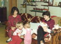 280 Christmas 1987 at Orrin and Charlotte Heinrich - Mary, Andrea, baby Em, baby Lyn, Deb, baby Lesly