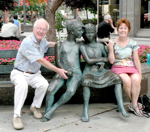 P1090194 Howard and Jane by statue, The Bench of Secrets, by Lea Vivot, downtown Montreal